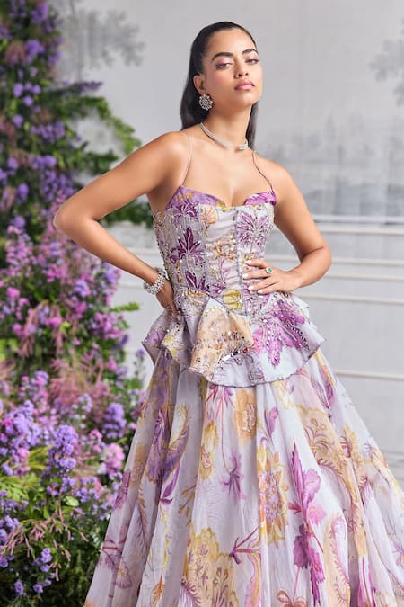 Shop Mahima Mahajan Lilac Silk Organza Sequins, Beads, Aira Floral Printed Peplum Corset Lehenga Set Online at Aza Fashions Shop_Mahima Mahajan_Lilac Silk Organza Sequins, Beads, Aira Floral Printed Peplum Corset Lehenga Set _Online_at_Aza_Fashions