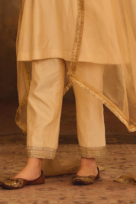 Buy_AFRIYA_Cream Chanderi , Organza Gota Patti, Metallic Border A-line Kurta Set _Online_at_Aza_Fashions