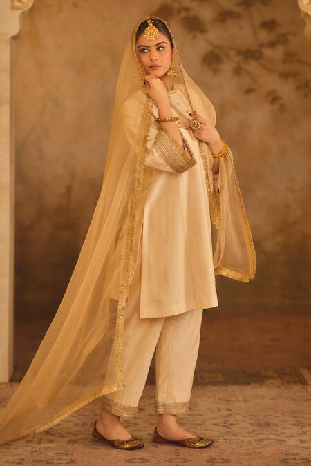 Shop_AFRIYA_Cream Chanderi , Organza Gota Patti, Metallic Border A-line Kurta Set _Online_at_Aza_Fashions