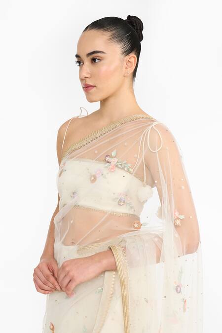 Gauri & Nainika_Ivory Tulle Embroidery, Sequins Sweetheart Neck Prima Vera Saree With Blouse _at_Aza_Fashions