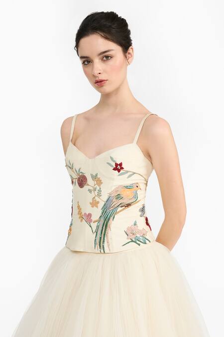 Shop Gauri & Nainika Ivory Silk, Crepe Embroidery Sweetheart Chinoiserie Peplum Top With Lehenga Online at Aza Fashions Shop_Gauri & Nainika_Ivory Silk, Crepe Embroidery Sweetheart Chinoiserie Peplum Top With Lehenga _Online_at_Aza_Fashions