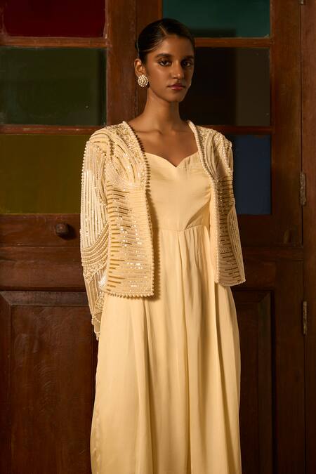 Buy Saangi Ivory Viscose, Satin Sequins, Pearls Poise Jumpsuit With Embroidered Jacket Online at Aza Fashions Buy_Saangi_Ivory Viscose, Satin Sequins, Pearls Poise Jumpsuit With Embroidered Jacket _Online_at_Aza_Fashions