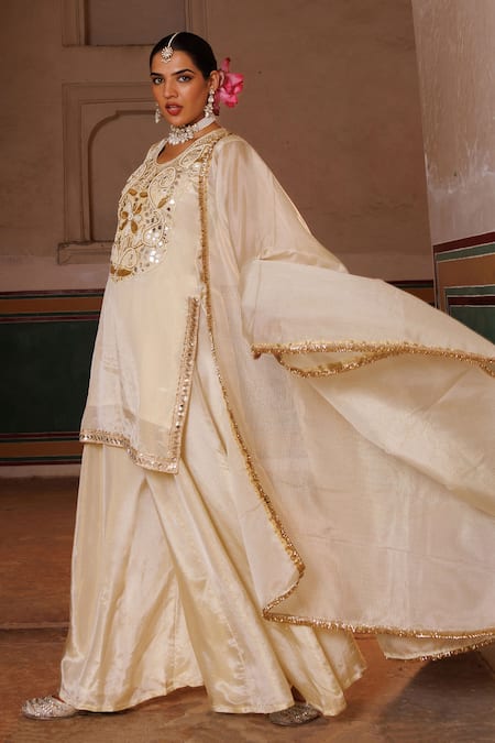 Buy Bannhi By Priyanka Rathore Ivory Georgette, Doriya Embroidery, Mirrors, Hand Tissue Kurta Sharara Set Online at Aza Fashions Buy_Bannhi By Priyanka Rathore_Ivory Georgette, Doriya Embroidery, Mirrors, Hand Tissue Kurta Sharara Set _Online_at_Aza_Fashions