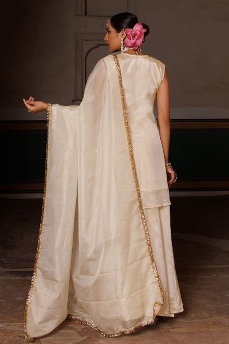 Shop Bannhi By Priyanka Rathore Ivory Georgette, Doriya Embroidery, Mirrors, Hand Tissue Kurta Sharara Set at Aza Fashions Shop_Bannhi By Priyanka Rathore_Ivory Georgette, Doriya Embroidery, Mirrors, Hand Tissue Kurta Sharara Set _at_Aza_Fashions