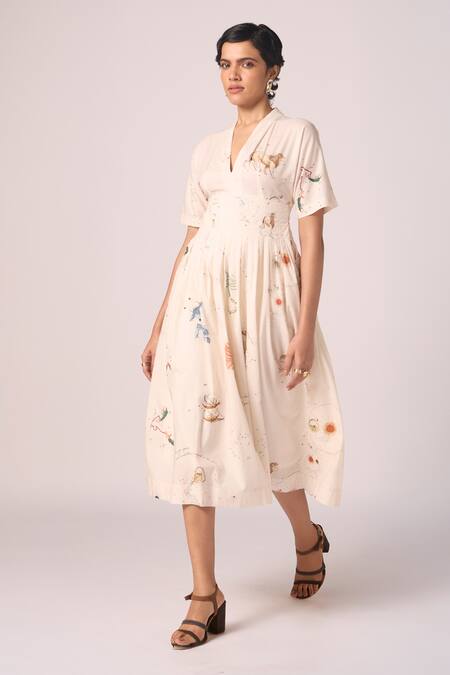 The Summer House Cream Cambric, Cotton V-neck Aara Zodiac Print Pleated Midi Dress Online at Aza Fashions The Summer House_Cream Cambric, Cotton V-neck Aara Zodiac Print Pleated Midi Dress _Online_at_Aza_Fashions