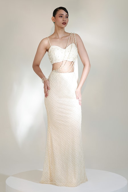 Shop Libas Cafe by Nidhi & Ashish Ivory Net Pearls, Tassels, Embroidery Sweetheart Neck Power Glaze Skirt Set Online at Aza Fashions Shop_Libas Cafe by Nidhi & Ashish_Ivory Net Pearls, Tassels, Embroidery Sweetheart Neck Power Glaze Skirt Set _Online_at_Aza_Fashions