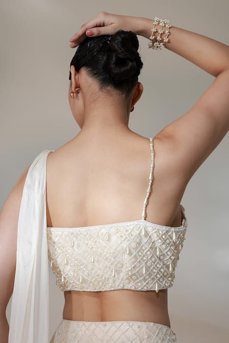 Shop Libas Cafe by Nidhi & Ashish Ivory Net Pearls, Tassels, Embroidery Sweetheart Neck Power Glaze Skirt Set at Aza Fashions Shop_Libas Cafe by Nidhi & Ashish_Ivory Net Pearls, Tassels, Embroidery Sweetheart Neck Power Glaze Skirt Set _at_Aza_Fashions