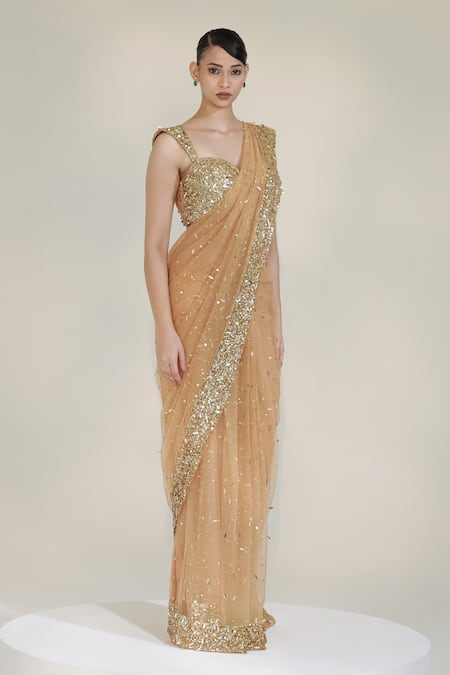 Libas Cafe by Nidhi & Ashish_Gold Net Sequins, Embroidery Sweetheart Neck Glam Pre-draped Saree With Blouse _Online_at_Aza_Fashions