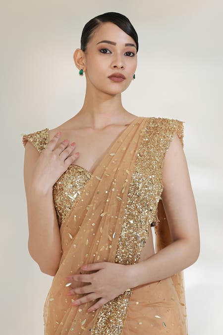Shop_Libas Cafe by Nidhi & Ashish_Gold Net Sequins, Embroidery Sweetheart Neck Glam Pre-draped Saree With Blouse _Online_at_Aza_Fashions