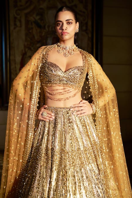 Buy_Seema Gujral_Gold Net Sequins, Crystals, Tassels, Embroidery Sweetheart Neck Lehenga Set 