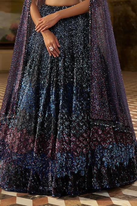 Seema Gujral_Blue Net Sequins, Tassels V-neck Jewel Tone Embroidered Lehenga Set _at_Aza_Fashions