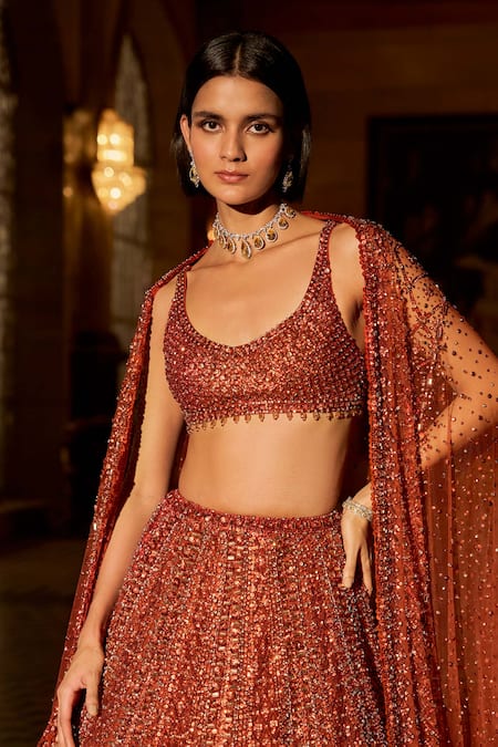 Buy_Seema Gujral_Orange Net Crystals, Sequins, Beads, Tassels, Embroidery Copper Lehenga Set _Online_at_Aza_Fashions