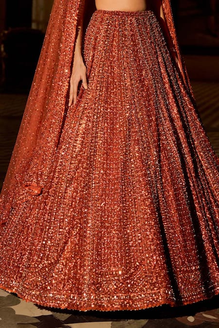 Shop_Seema Gujral_Orange Net Crystals, Sequins, Beads, Tassels, Embroidery Copper Lehenga Set _Online_at_Aza_Fashions