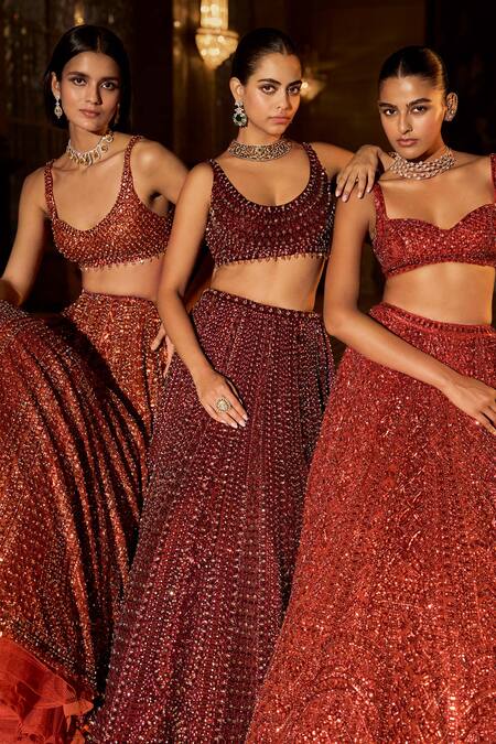 Seema Gujral_Orange Net Crystals, Sequins, Beads, Tassels, Embroidery Copper Lehenga Set _at_Aza_Fashions