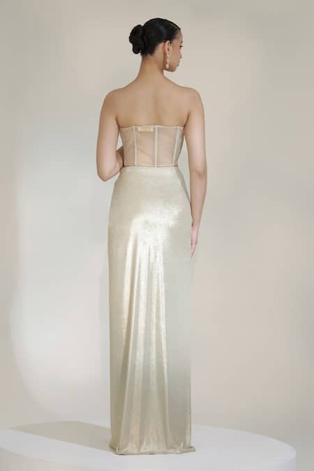 Shop Libas Cafe by Nidhi & Ashish Gold Lycra, Net Sequins, Beads Champagne Embroidered Corset With Dhoti Skirt at Aza Fashions Shop_Libas Cafe by Nidhi & Ashish_Gold Lycra, Net Sequins, Beads Champagne Embroidered Corset With Dhoti Skirt _at_Aza_Fashions