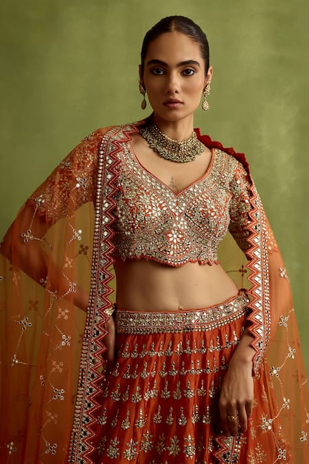 SUHINO_Orange Silk, Net Mirrors, Embroidery, Zari V-neck Rust Lehenga Set _Online_at_Aza_Fashions