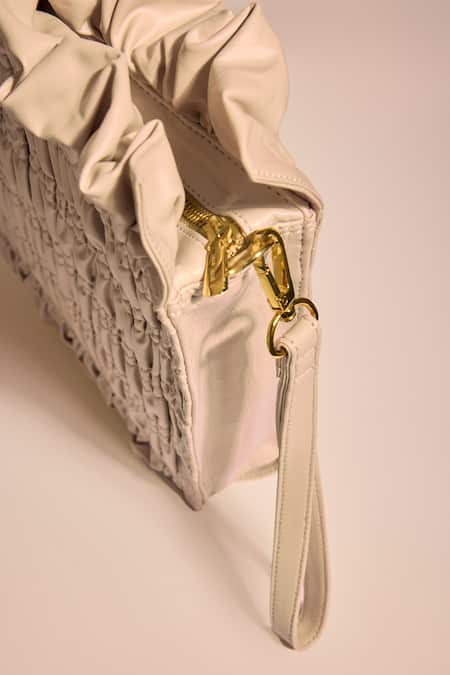 Buy_Tara And I_Cream Creme Drift Oversized Wristlet _Online_at_Aza_Fashions