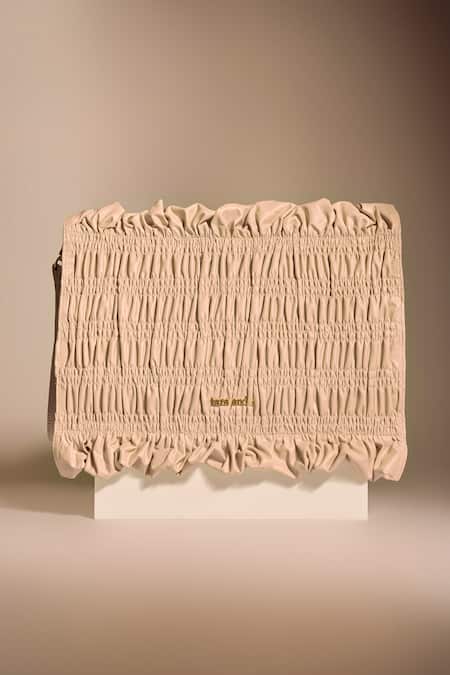 Shop_Tara And I_Cream Creme Drift Oversized Wristlet _Online_at_Aza_Fashions