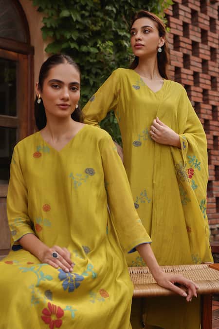 Vaayu_Yellow Muslin, Cotton Embroidery, Applique, Tassels Citrine Bloom Kurta Set _Online_at_Aza_Fashions