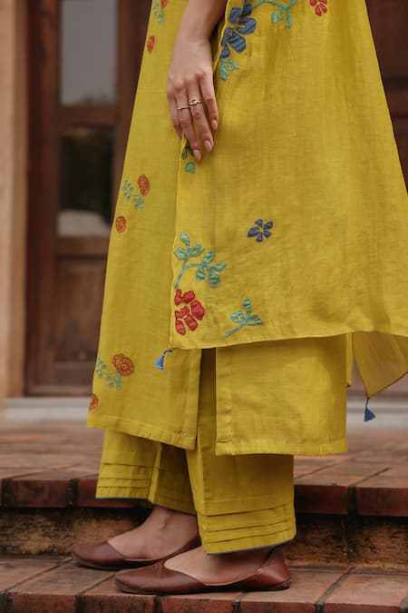 Shop_Vaayu_Yellow Muslin, Cotton Embroidery, Applique, Tassels Citrine Bloom Kurta Set _Online_at_Aza_Fashions