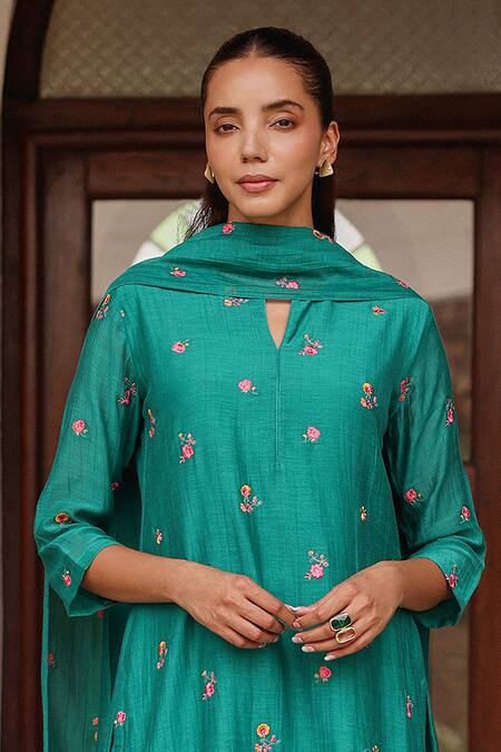Vaayu_Teal Muslin, Cotton Embroidery, Applique, Tassels Split V-neck Bloom Kurta Set _Online_at_Aza_Fashions