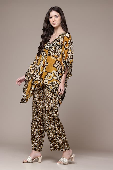 Buy_Ritu Kumar_Mustard Viscose, Crepe Tesha Tribal Print Asymmetric Kaftan Top And Pant Set _Online_at_Aza_Fashions