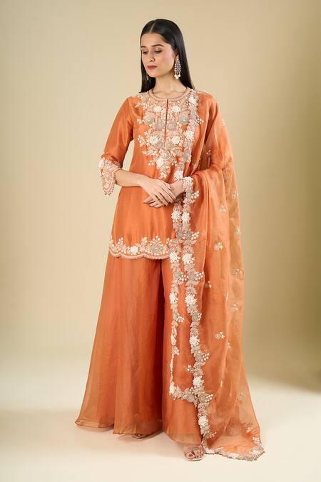 Prisho Orange Embroidery, Sequins, Beads, Metallic Thread Round Rust Short Kurta Set Online at Aza Fashions Prisho_Orange Embroidery, Sequins, Beads, Metallic Thread Round Rust Short Kurta Set _Online_at_Aza_Fashions
