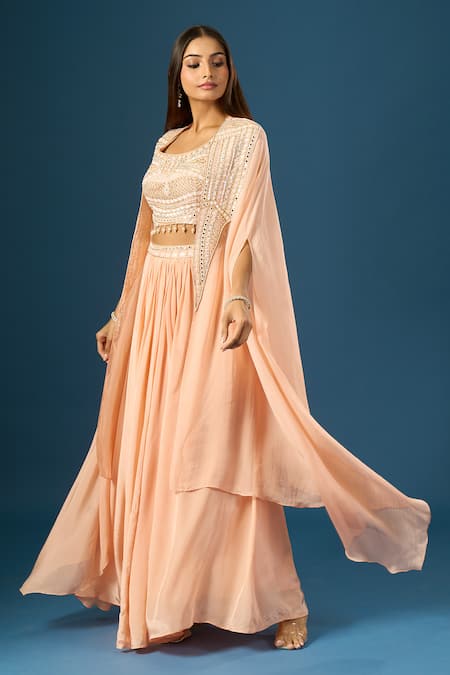 Samyukta Singhania Peach Organza, Crepe Mirrors, Sequins, Zari, Hand Embroidered Shrug Skirt Set Online at Aza Fashions Samyukta Singhania_Peach Organza, Crepe Mirrors, Sequins, Zari, Hand Embroidered Shrug Skirt Set _Online_at_Aza_Fashions