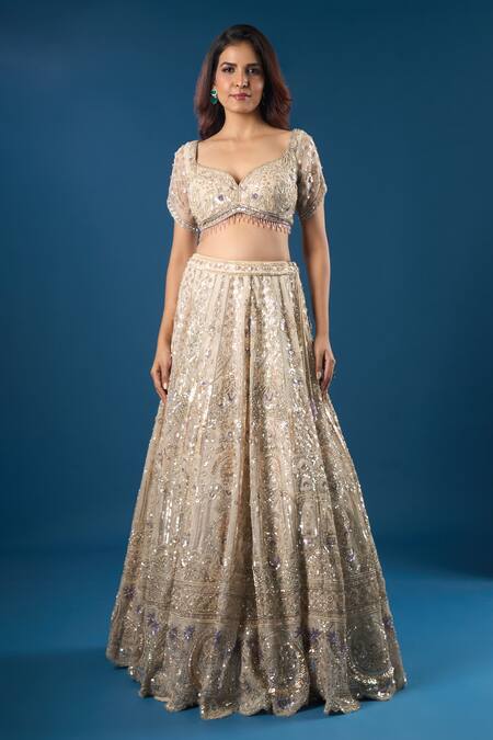 Azeera_Ivory Net Embroidery, Sequins, Zari, Beads Sweetheart Neck Lehenga Set _at_Aza_Fashions