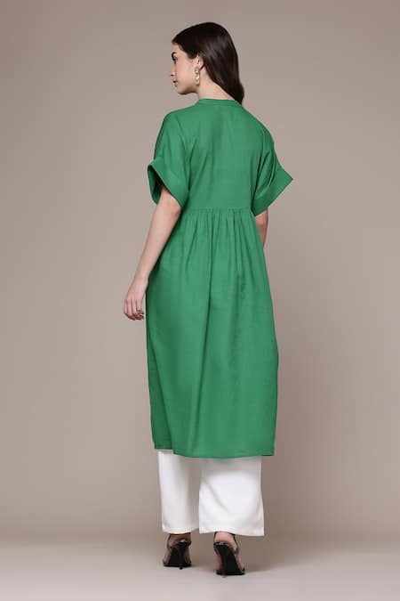 Shop Ritu Kumar Green Cotton Mandarin Collar Vasuki Pleated A-line Calf Length Kurta at Aza Fashions Shop_Ritu Kumar_Green Cotton Mandarin Collar Vasuki Pleated A-line Calf Length Kurta _at_Aza_Fashions