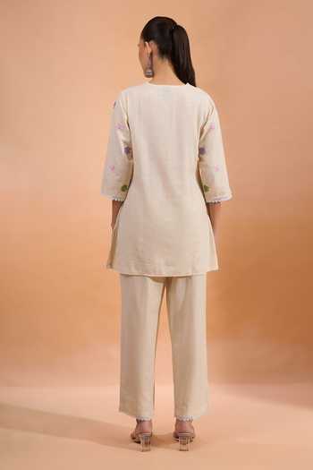 Shop Khwaab By Sanjana Lakhani Cream Linen Embroidery, Lace V-neck Kurta And Pant Set at Aza Fashions Shop_Khwaab By Sanjana Lakhani_Cream Linen Embroidery, Lace V-neck Kurta And Pant Set _at_Aza_Fashions