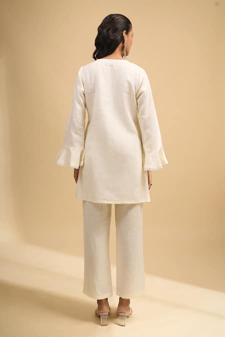 Shop Naintara Bajaj Cream Linen Embroidery Split V-neck Floral Kurta And Pant Set at Aza Fashions Shop_Naintara Bajaj_Cream Linen Embroidery Split V-neck Floral Kurta And Pant Set _at_Aza_Fashions