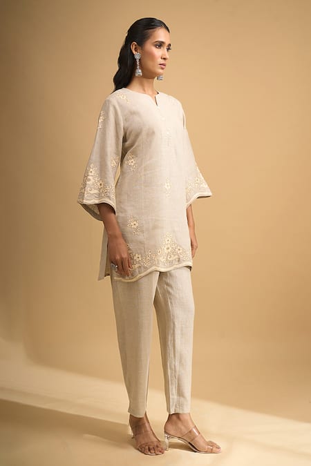 Naintara Bajaj Beige Linen Embroidery Split V-neck Kurta And Pant Set at Aza Fashions Naintara Bajaj_Beige Linen Embroidery Split V-neck Kurta And Pant Set _at_Aza_Fashions