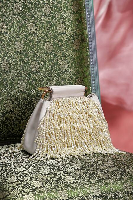 The Leather Garden_Ivory Beads, Pearls, Tassels Savera Mini Handbag _at_Aza_Fashions