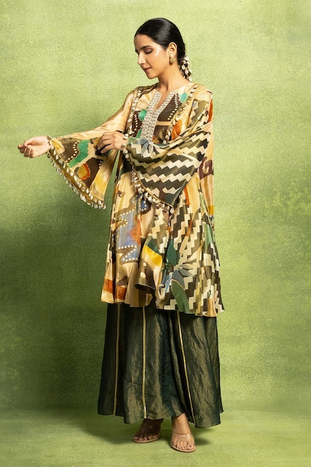 Shop Vedika M Beige Tissue, Silk Embroidery, Stones, Abstract Print Flared Kurta And Pant Set at Aza Fashions Shop_Vedika M_Beige Tissue, Silk Embroidery, Stones, Abstract Print Flared Kurta And Pant Set _at_Aza_Fashions