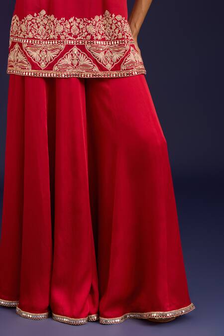 Devnaagri_Red Modal, Satin Embroidery, Sequins V-neck Kurta Sharara Set _at_Aza_Fashions