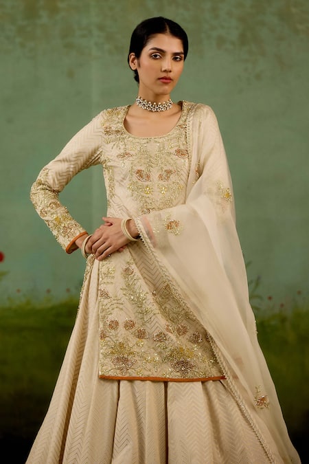 Shyam Narayan Prasad Ivory Brocade, Organza Embroidery, Metallic Thread, Zardozi Kurta Lehenga Set Online at Aza Fashions Shyam Narayan Prasad_Ivory Brocade, Organza Embroidery, Metallic Thread, Zardozi Kurta Lehenga Set _Online_at_Aza_Fashions
