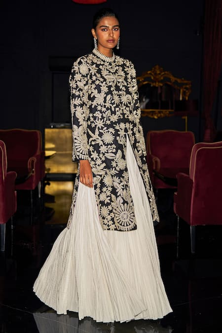 Dash And Dot Black Polyester, Viscose, Spandex Embroidery High Jacket And Pleated Skirt Set Online at Aza Fashions Dash And Dot_Black Polyester, Viscose, Spandex Embroidery High Jacket And Pleated Skirt Set _Online_at_Aza_Fashions