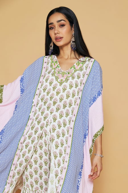 Shop SAKSHI GIRRI Ivory Georgette Sequins, Stones, Beads Floral Printed Kaftan And Sharara Set Online at Aza Fashions Shop_SAKSHI GIRRI_Ivory Georgette Sequins, Stones, Beads Floral Printed Kaftan And Sharara Set_Online_at_Aza_Fashions