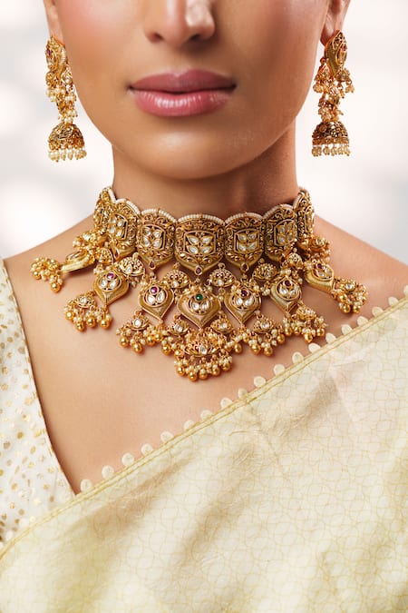 Zevar By Geeta Gold Plated Stones, Pearls, Crystals Kundan Temple Necklace Set Online at Aza Fashions Zevar By Geeta_Gold Plated Stones, Pearls, Crystals Kundan Temple Necklace Set _Online_at_Aza_Fashions