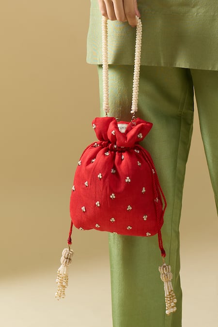Nazaakat By Samara Singh Red Embroidery, Zari, Beads, Tassels Myra Hand Potli Bag at Aza Fashions Nazaakat By Samara Singh_Red Embroidery, Zari, Beads, Tassels Myra Hand Potli Bag _at_Aza_Fashions