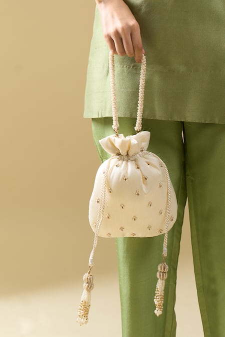 Shop Nazaakat By Samara Singh Off White Embroidery, Zari, Beads, Tassels Myra Hand Potli Bag Online at Aza Fashions Shop_Nazaakat By Samara Singh_Off White Embroidery, Zari, Beads, Tassels Myra Hand Potli Bag _Online_at_Aza_Fashions