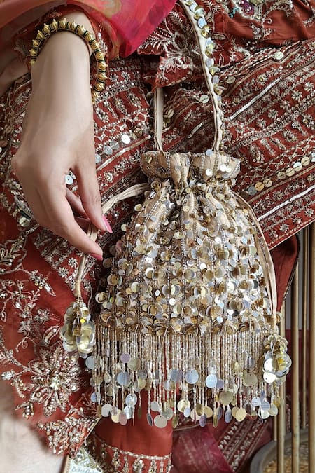Buy_Plode_Silver Sequins, Tassels Pataka Potli Bag _Online_at_Aza_Fashions