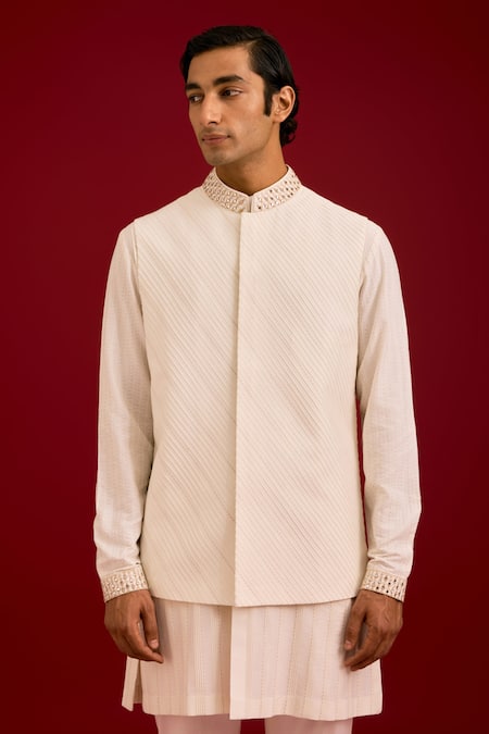 Shop_Devnaagri_Ivory Cotton, Silk, Lycra Mirrors, Embroidery Pintuck Pattern Bundi Kurta Set _Online_at_Aza_Fashions