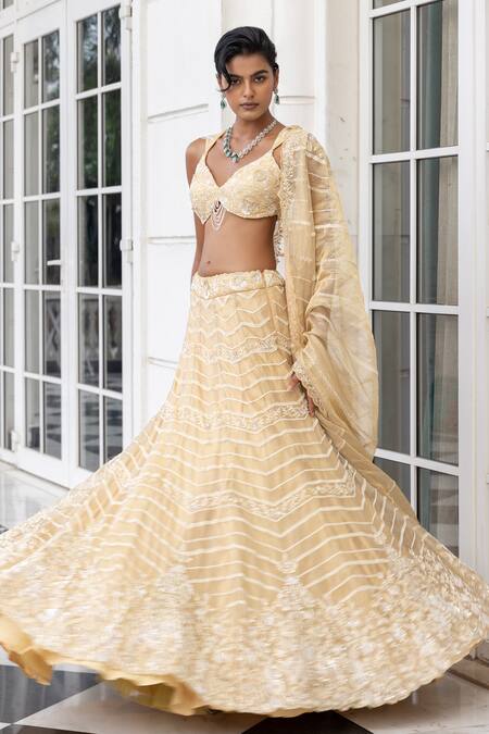 House Of Armuse Yellow Tissue, Organza Embroidery, Beads, Chains, Metallic Ivory Lehenga Set Online at Aza Fashions House Of Armuse_Yellow Tissue, Organza Embroidery, Beads, Chains, Metallic Ivory Lehenga Set _Online_at_Aza_Fashions