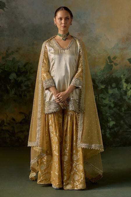 Shop Mustard Moon By Neyha And Vrinda Gold Brocade, Georgette, Net Mirrors, Sequins, Pattern Kurta Sharara Set Online at Aza Fashions Shop_Mustard Moon By Neyha And Vrinda_Gold Brocade, Georgette, Net Mirrors, Sequins, Pattern Kurta Sharara Set _Online_at_Aza_Fashions