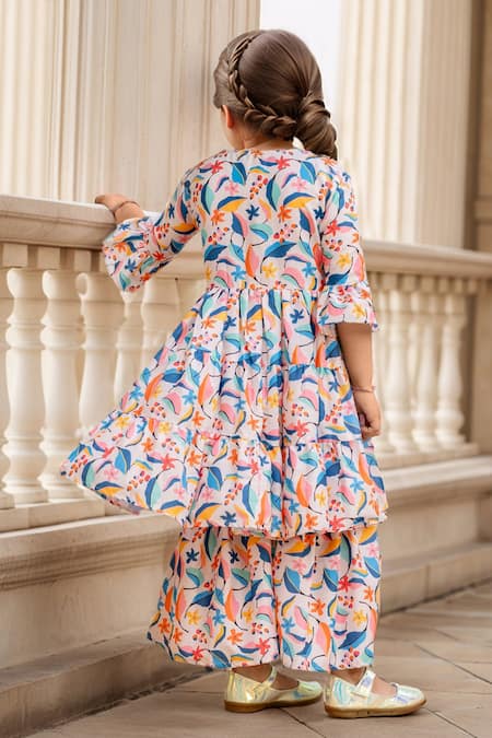 Shop Petite Pomme Multi Color Muslin, Net Lace, Floral Print Tiered Peplum Kurta And Sharara Set at Aza Fashions Shop_Petite Pomme_Multi Color Muslin, Net Lace, Floral Print Tiered Peplum Kurta And Sharara Set _at_Aza_Fashions