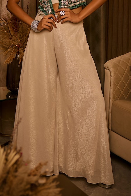 Babita Malkani_Ivory Satin Crystals, Sequins, Crushed Fabric Bustier Jacket And Flared Pant Set _at_Aza_Fashions