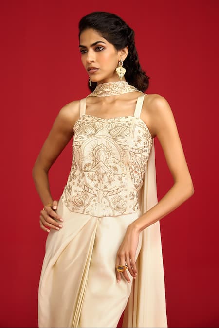 Buy_Megha Pitti_Ivory Modal, Satin, Crepe Sequins, Zari, Embroidery Corset Draped Skirt Set _Online_at_Aza_Fashions