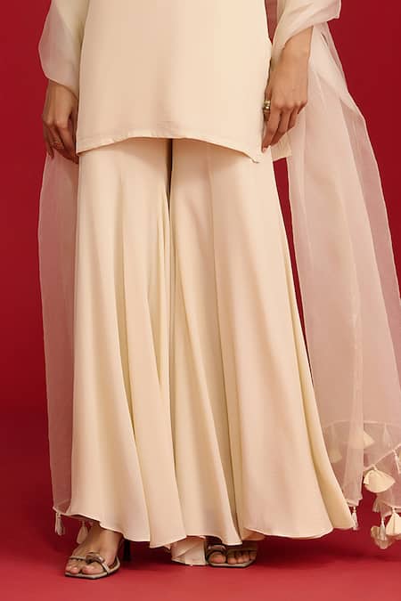 Buy_Megha Pitti_Ivory Crepe, Organza Embroidery, Sequins, Zari, Tassels Hand Kurta Gharara Set _Online_at_Aza_Fashions